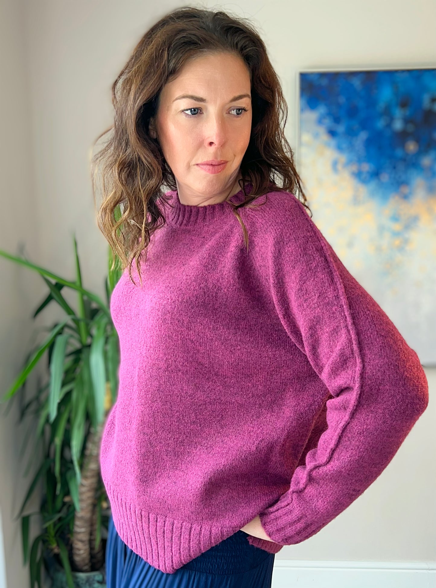 Magenta jumper made with recycled fabric