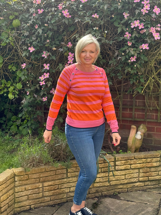 Stripy pink and orange pullover with button detail