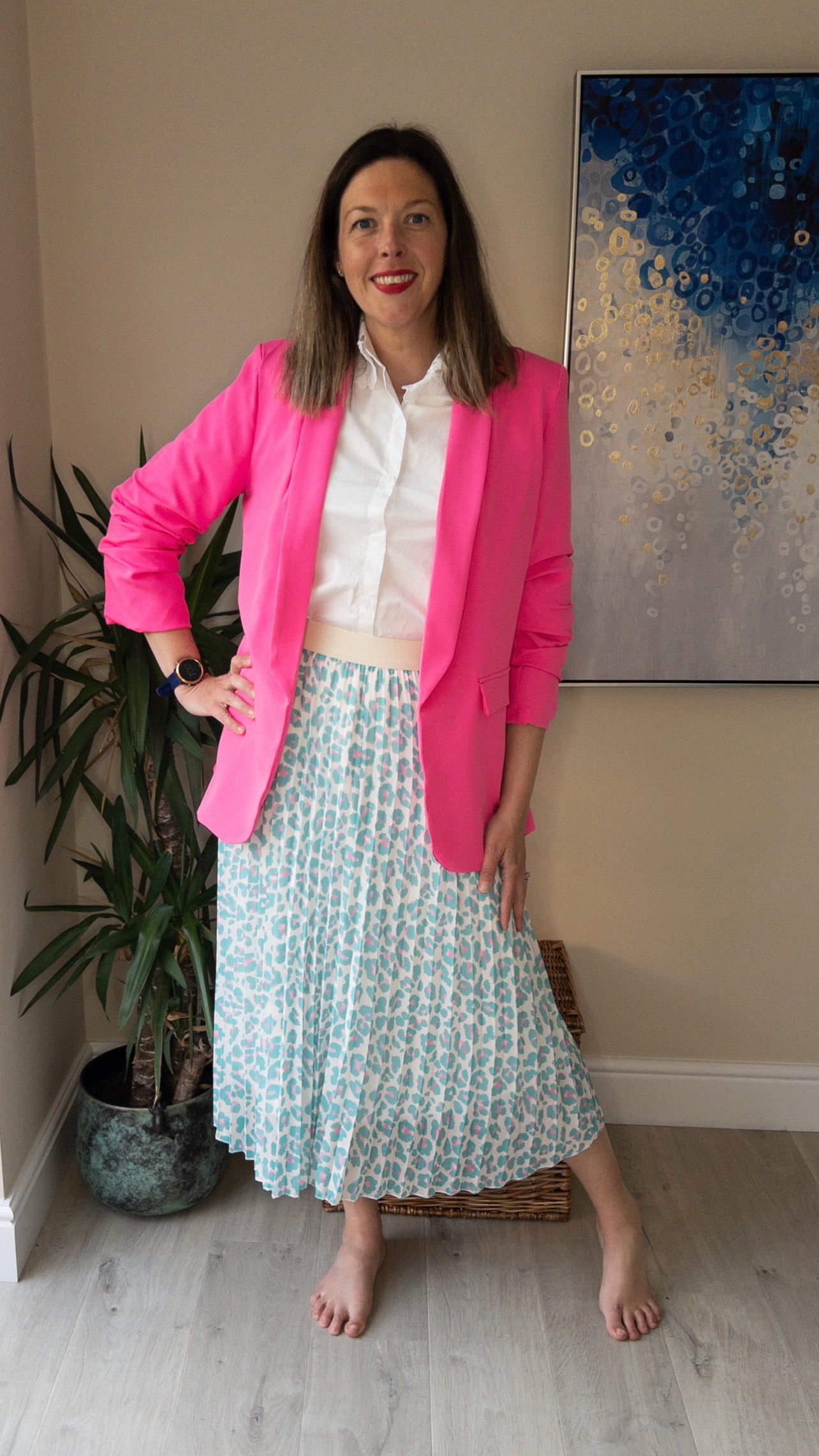 Pink blazer and leopard skirt