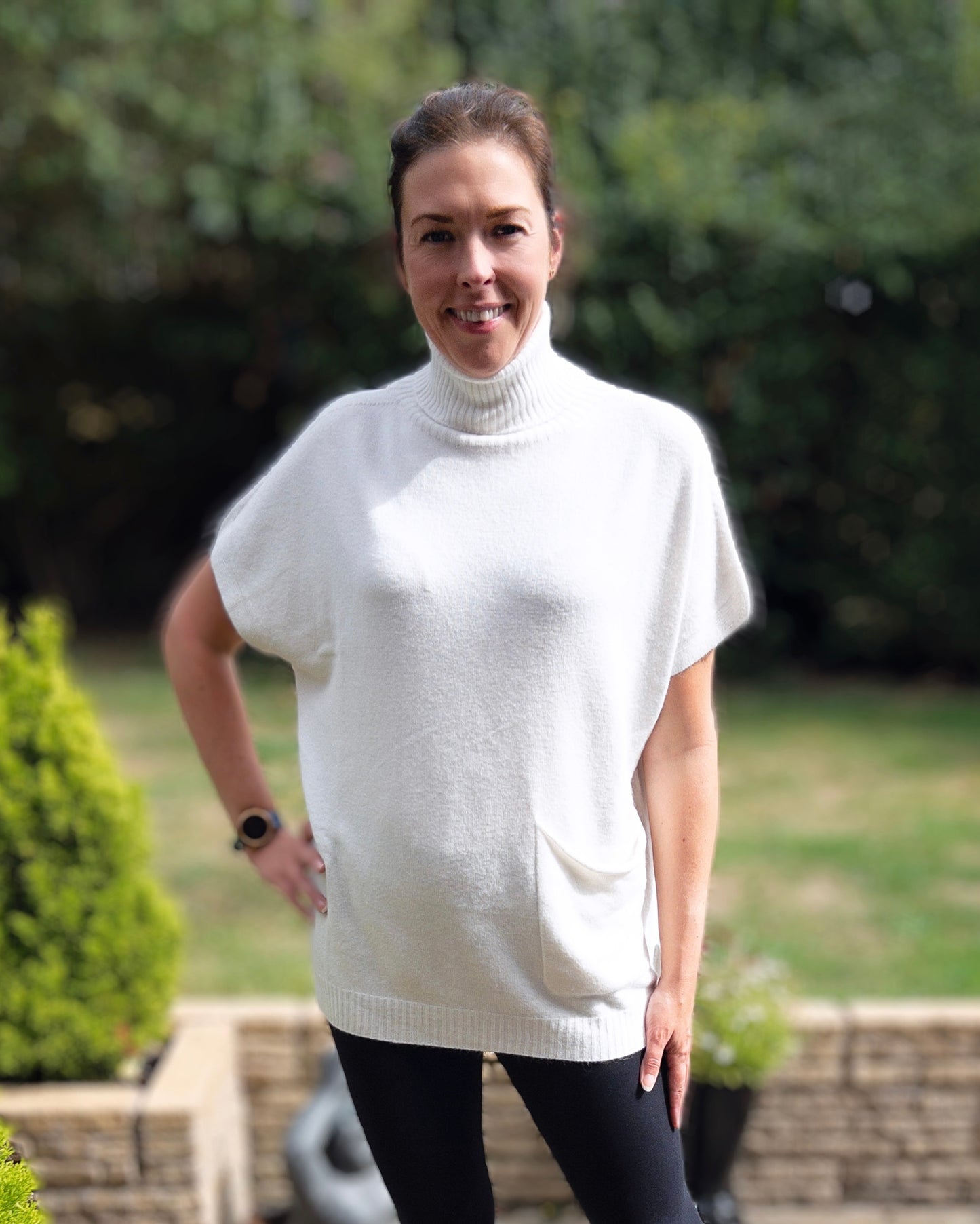 Roll neck swing style jumper