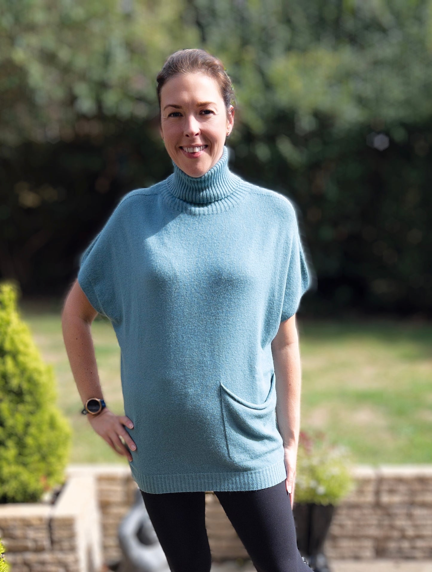 Roll neck swing style jumper