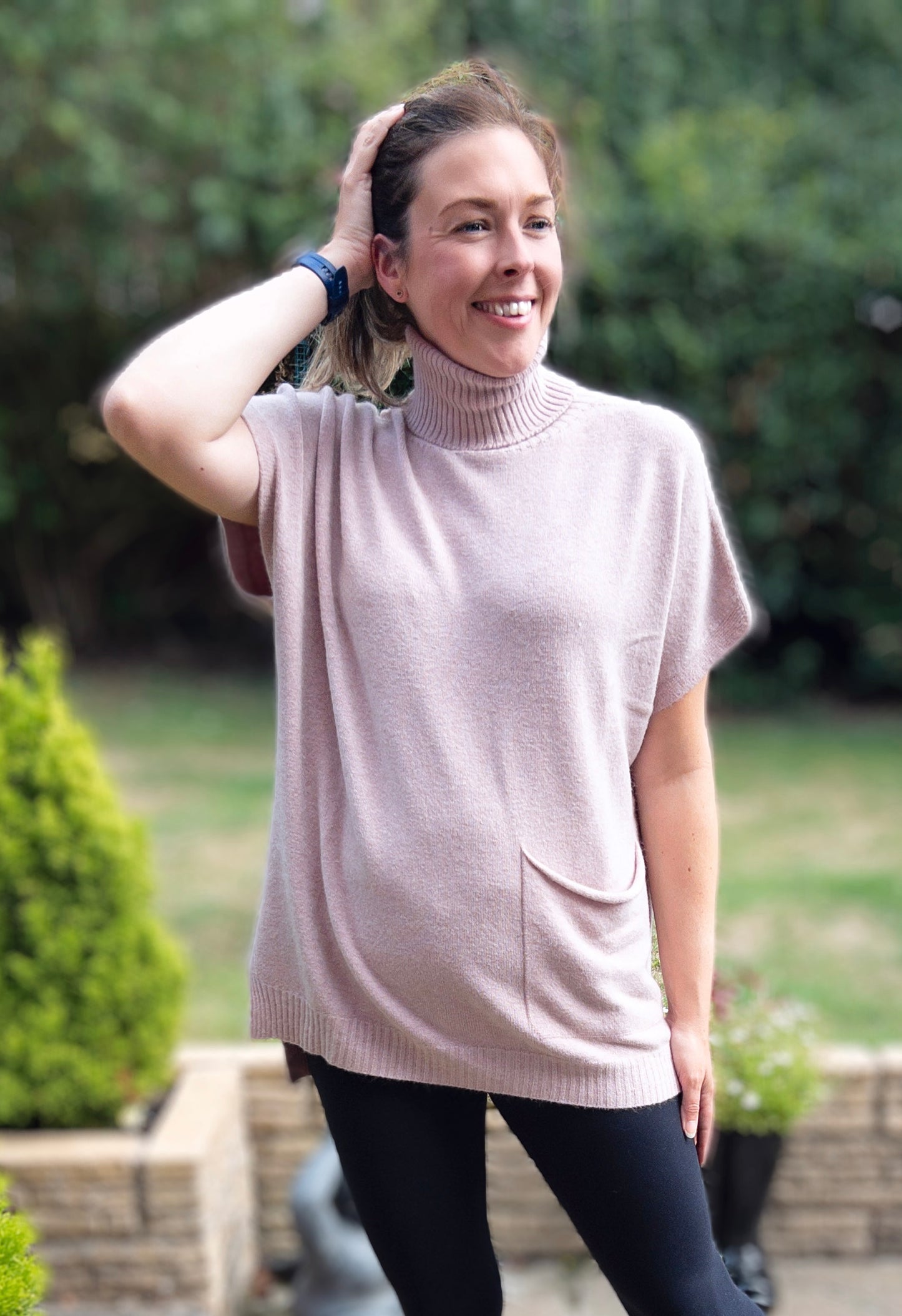 Roll neck swing style jumper